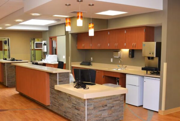 Nurses station with desks and cabinetry