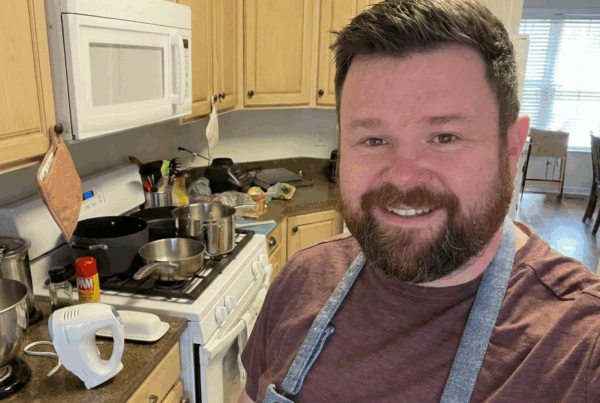 Travis Landers cooking in a kitchen
